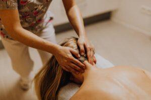 A soothing neck massage focused on relaxation and wellbeing in a therapy setting.